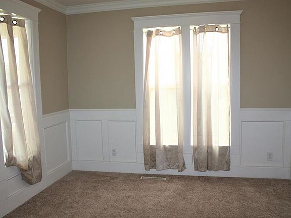 Dining room with library paneling