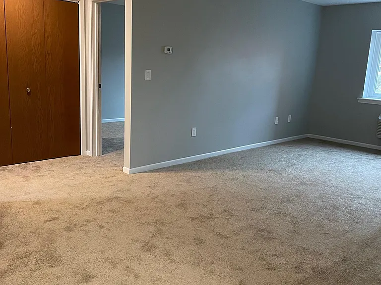 View from Galley Kitchen Entry towards Living Area and Master Bedroom