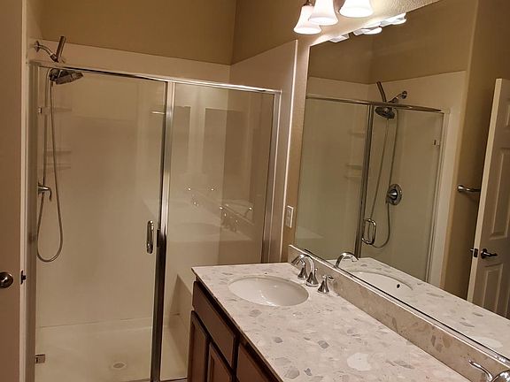 His and Hers wash basin, Walk in shower with bench in attached Master Bedroom suite