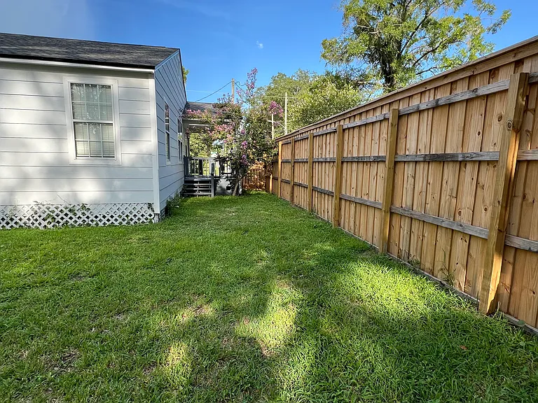 View from patio area to main entrance of house.
