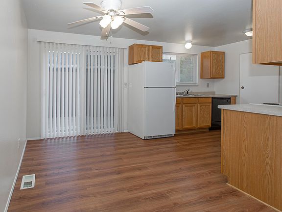 Dining Area w/ sliding glass door
 & Kitchen