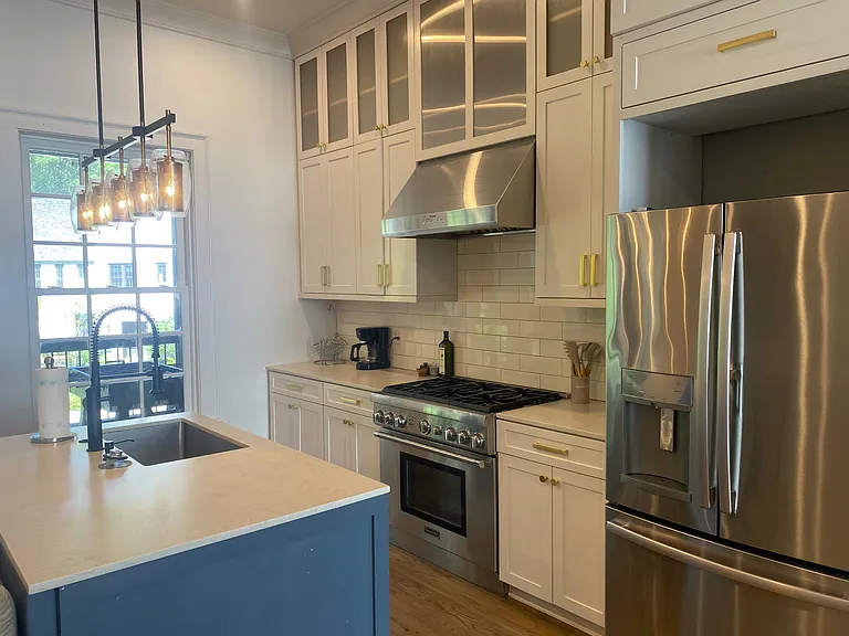 Main floor, living & dining, kitchen w/walk-in pantry.