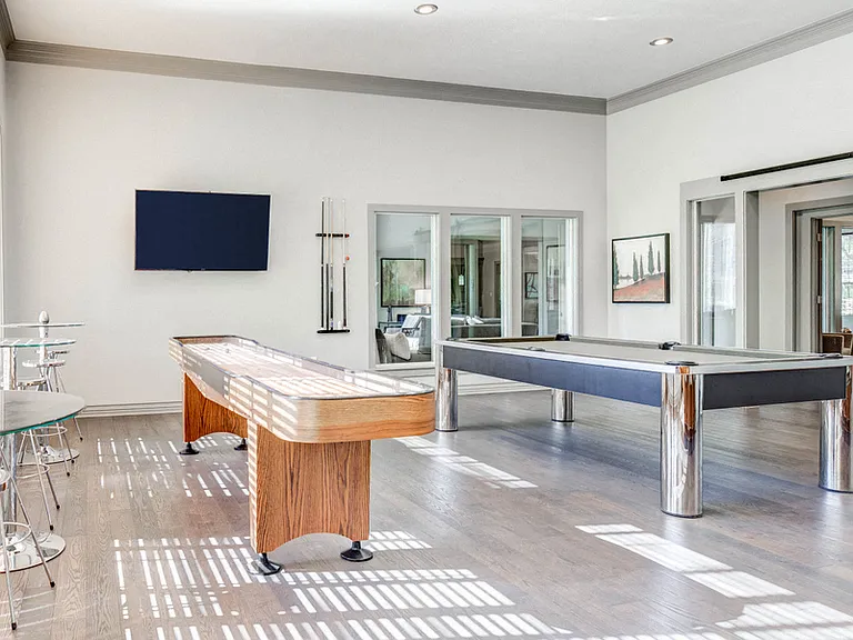 Game Lounge with shuffle board and pool table