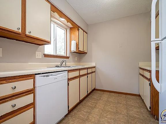 Refrigerator, stove, and dishwasher included