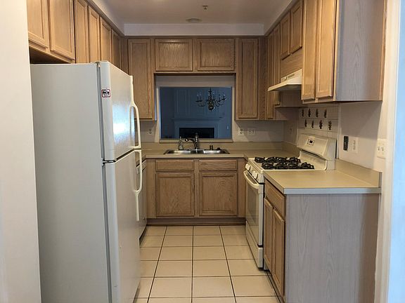 Kitchen with gas stove.