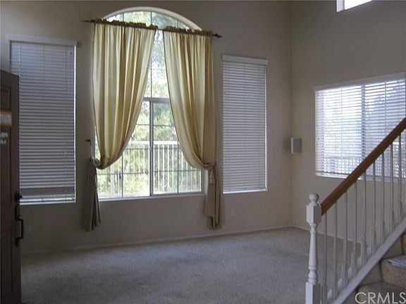 Cathedral ceiling and tall sweeping windows