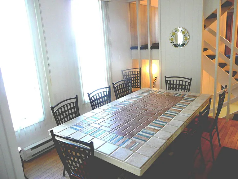 Dining Area seats 8 at the table, plus room for more.