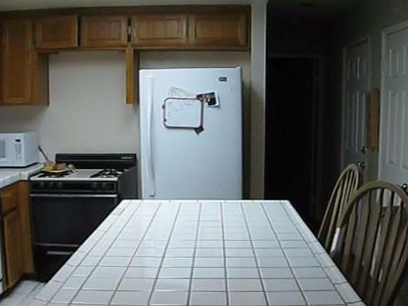 Kitchen Island View hallway to downstairs bed3 and full bath