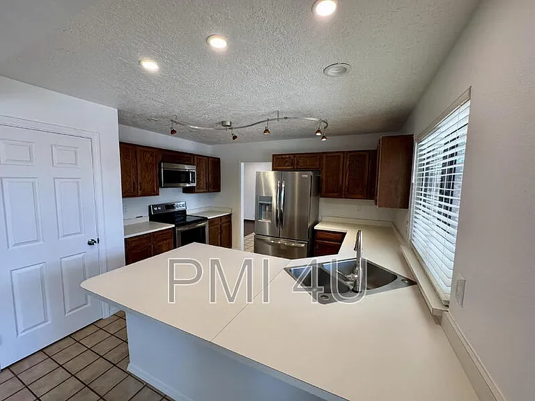 10412 La Paz Dr NW — Photo 10
