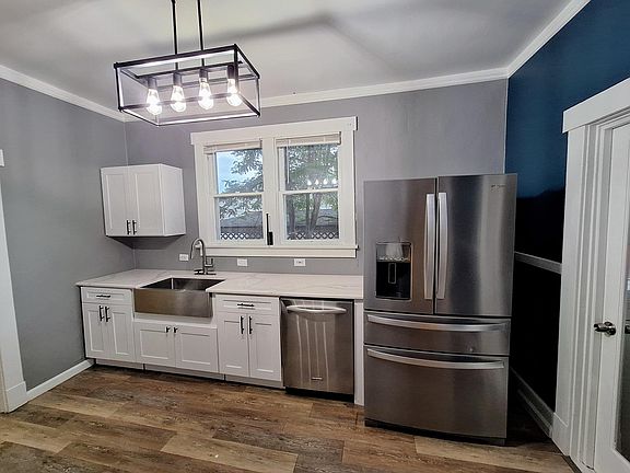 Kitchen with granite counter tops and stainless steel appliances
