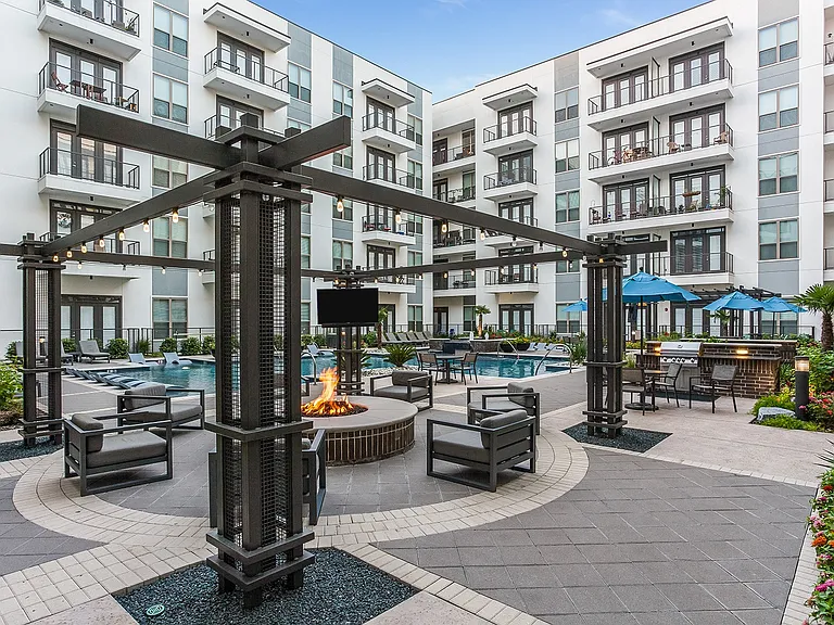 Luxurious outdoor amenities include- fire pit, grilling stations, lounge areas and more.