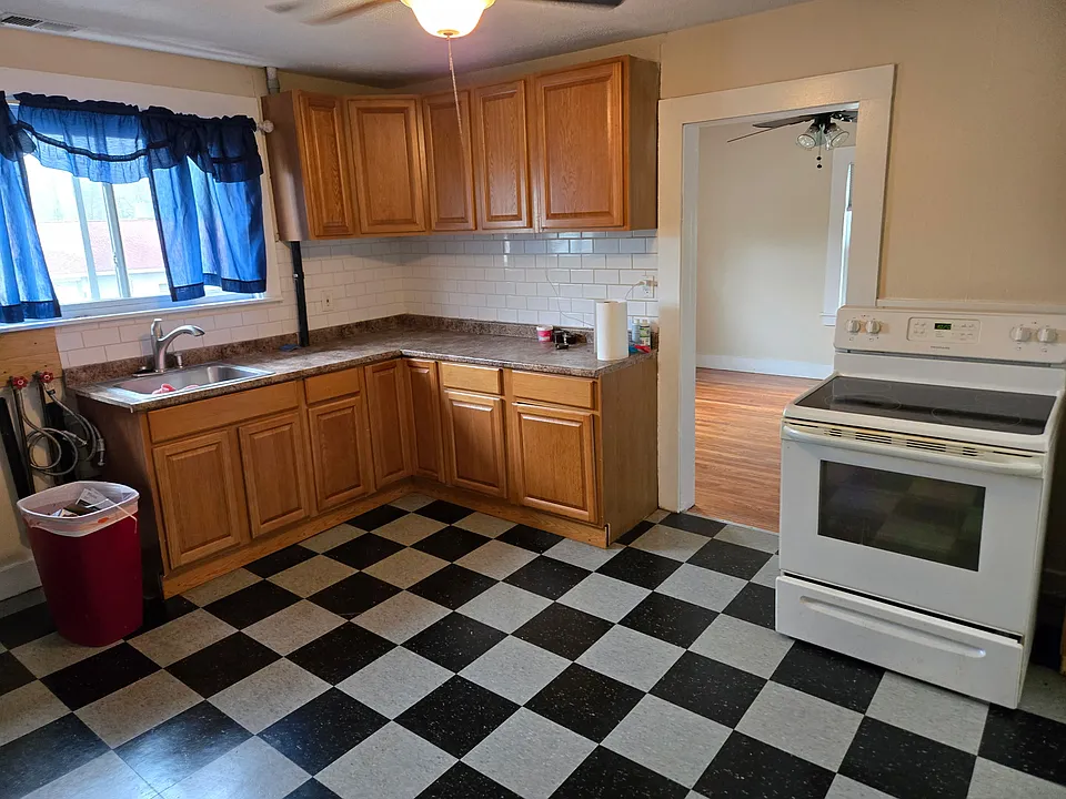 Kitchen with stack washer dryer, large pantry, room for a table...