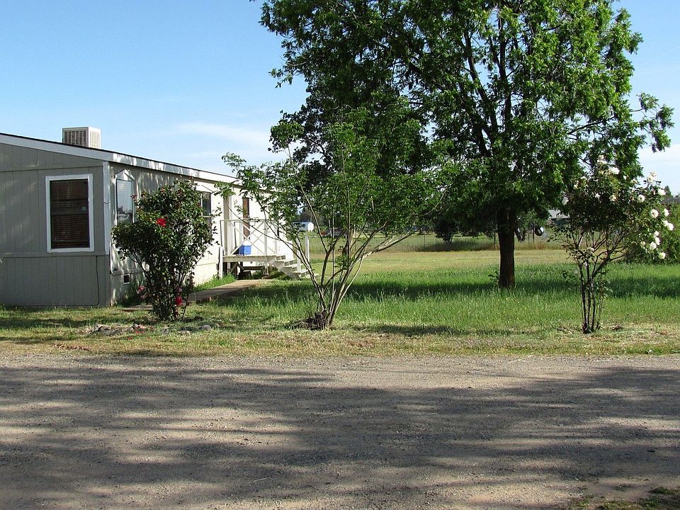 Parking Area and Front of Home
