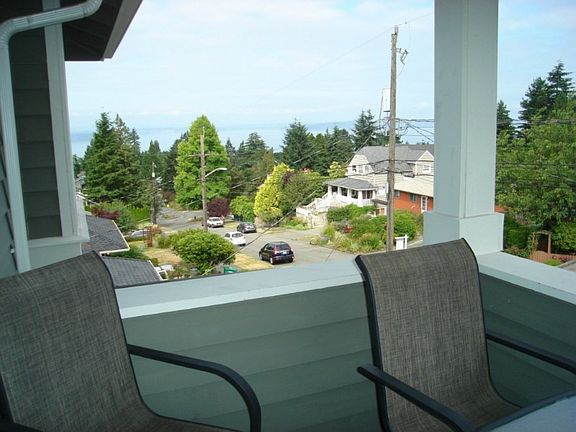 Formal living area with 1st of 3 fireplaces.