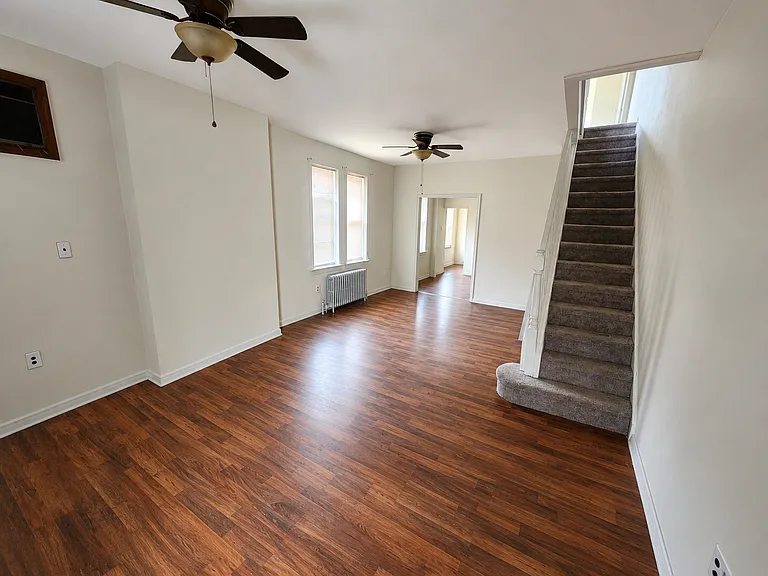 Huge entrance/living space, leads into dining and kitchen in back