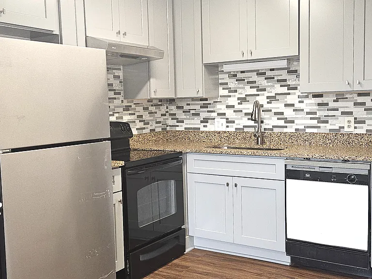 New Kitchen Slow-Close Cabinets and Granite Counter Top