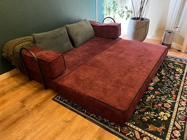 The sofa folds out to a lounger, perfect for movie nights.