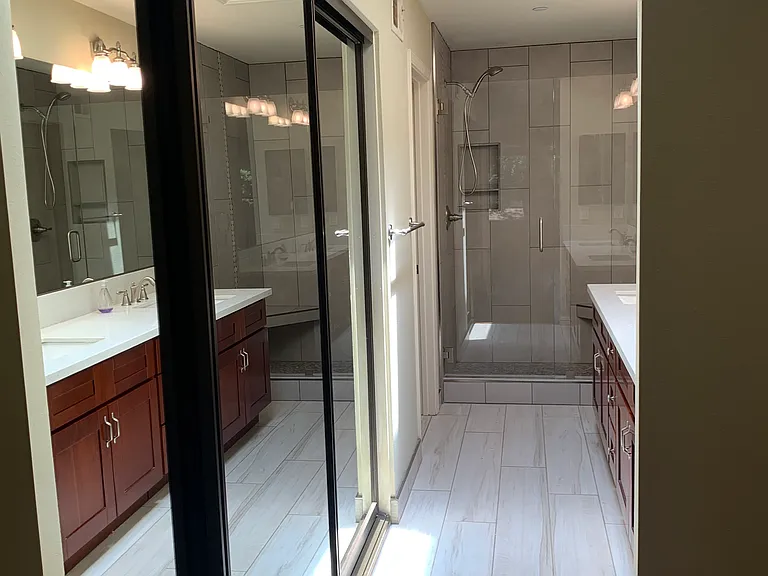 Master bathroom with large closets.