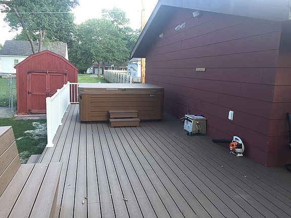 Hot tub north side of deck. 