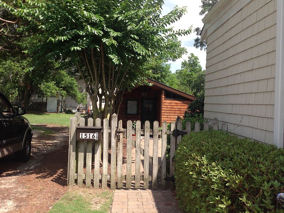 Cottage located in fenced back yard