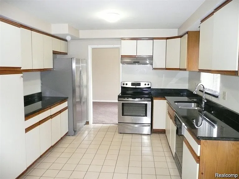 Kitchen with newer SS appliances