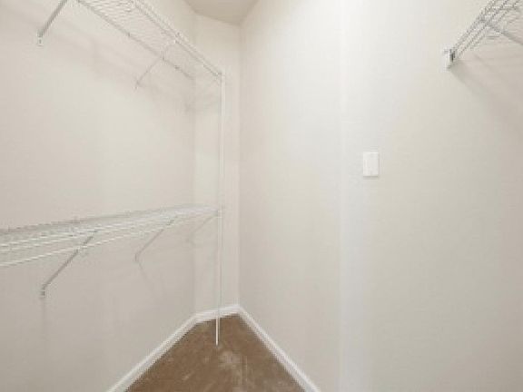 spacious walk in closet