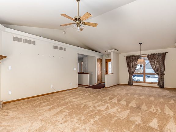 Great for entertaining! Living room has a gas fireplace and has access to the deck.
