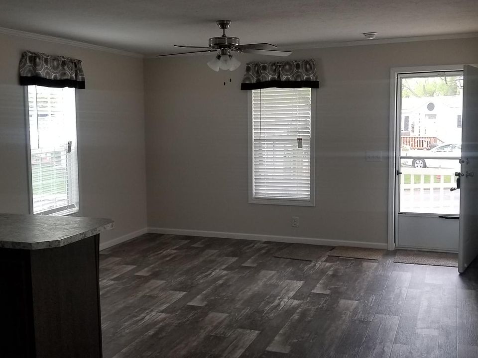 Nice open floor plan with beautiful flooring. Carpet in Bedrooms.