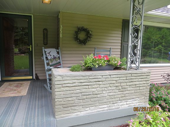Front porch with stone flower box