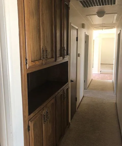 Large Linen Cabinets in Hallway