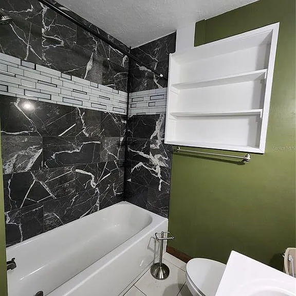 1014 NE 10th Pl — Photo 47