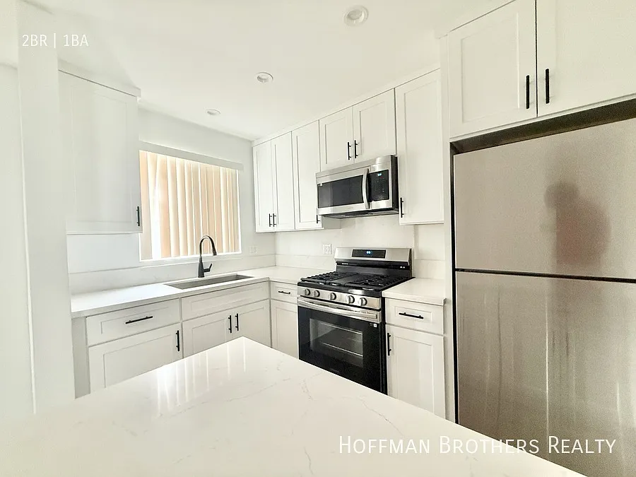 Building Photo - 7245 Bakman Ave #3