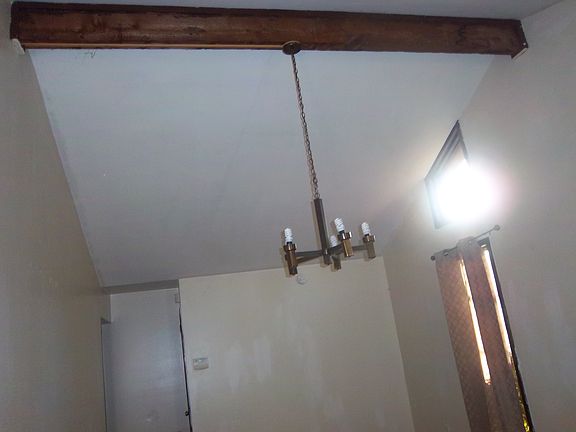 Living Room Exposed beams Vaulted Ceiling