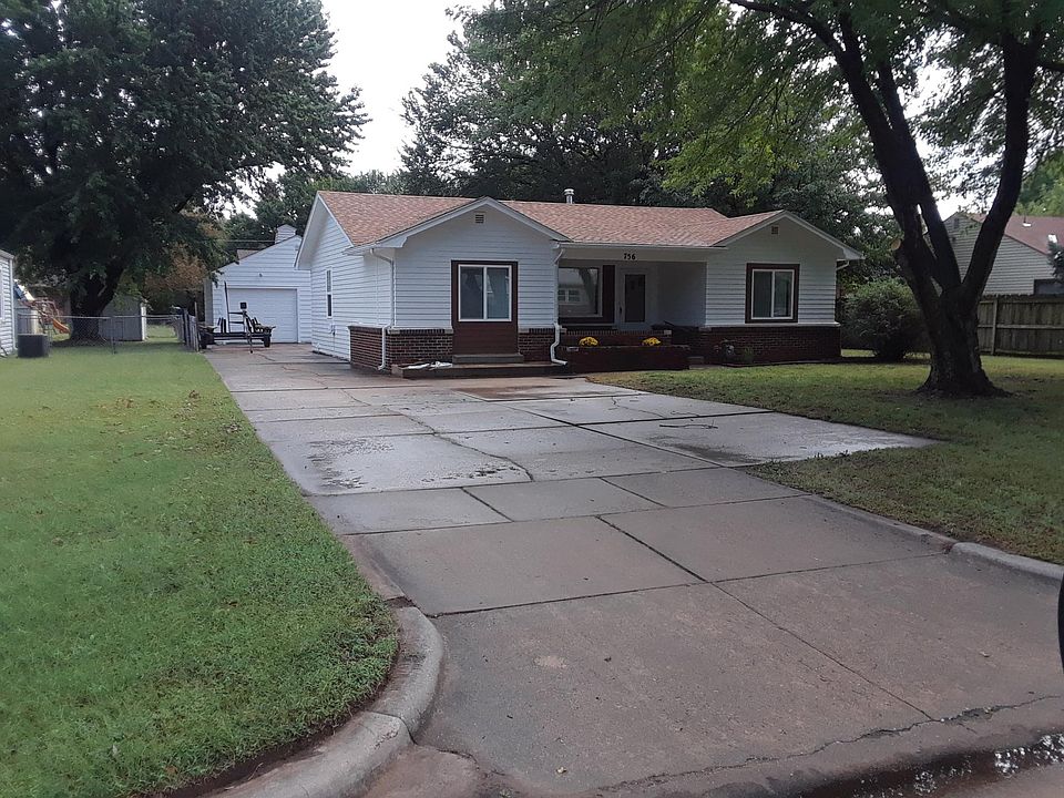 Large garage in back.