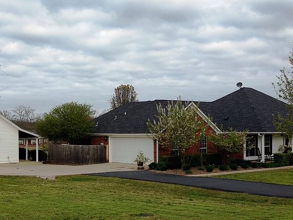 Side garage; shop on left