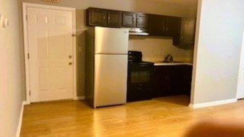 Efficiency kitchen with all appliances along with washer dryer access.