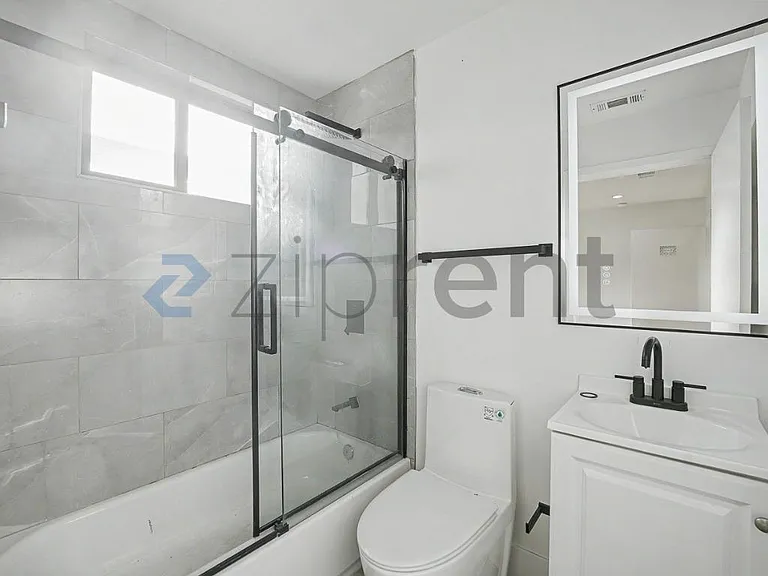 1438 W 37th Dr — Photo 20