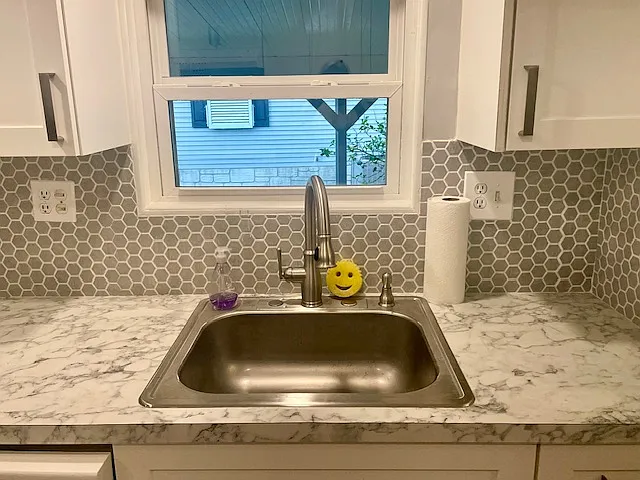 kitchen looks out over the covered porch