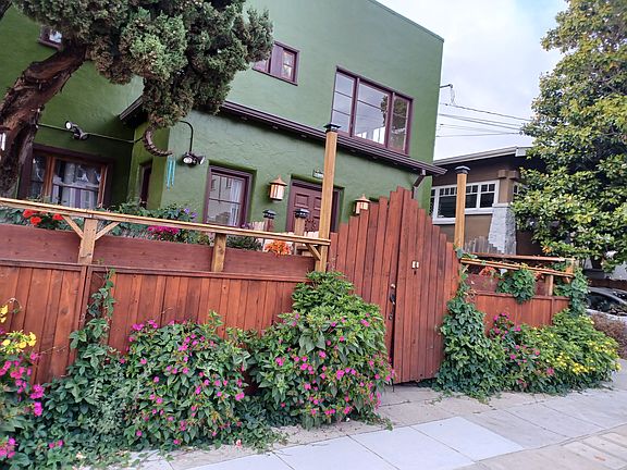 Bldg. front with domesticated flowers