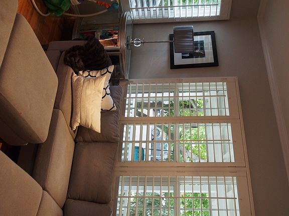 Living Room and shutters with new windows throughout!