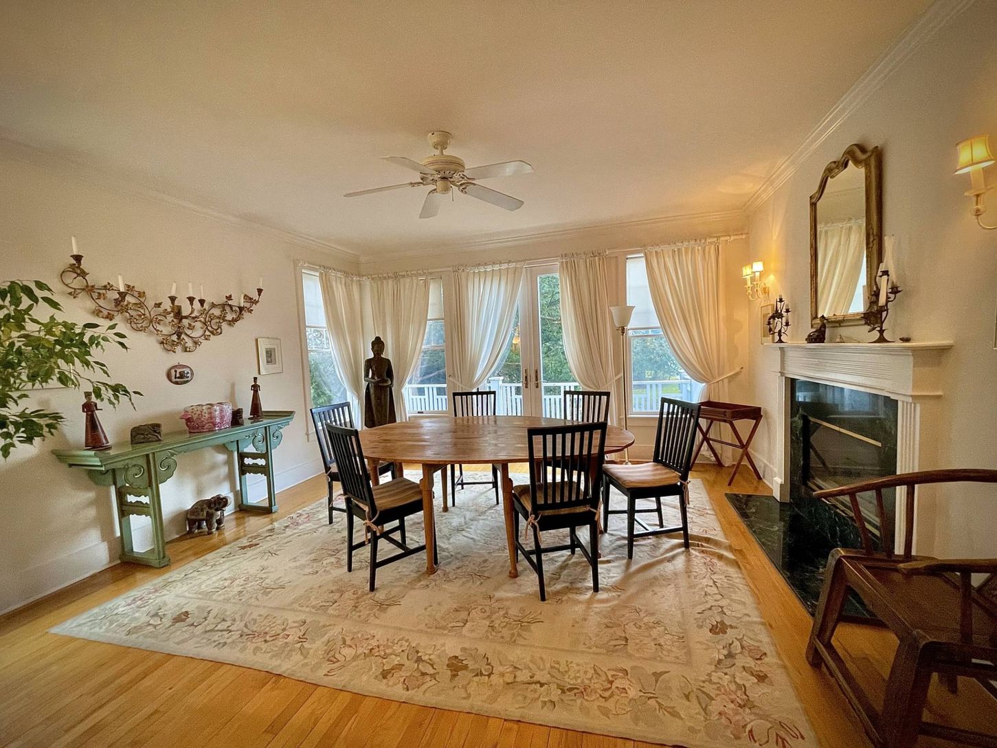 formal dining room with French doors to deck and backyard
