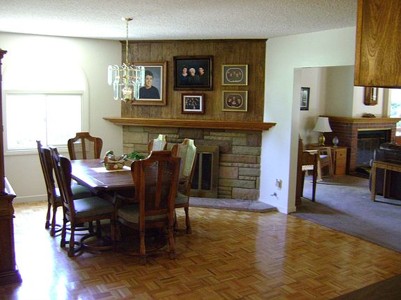 Formal Dining Room With Fireplace