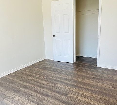 Gorgeous bedroom with wood floors