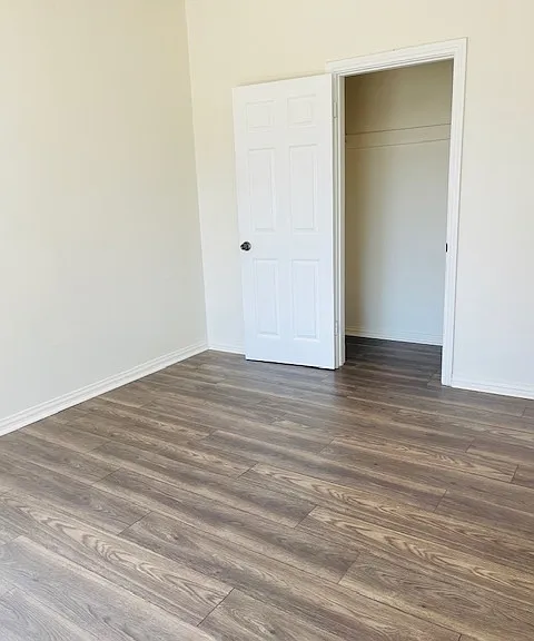 Gorgeous bedroom with wood floors