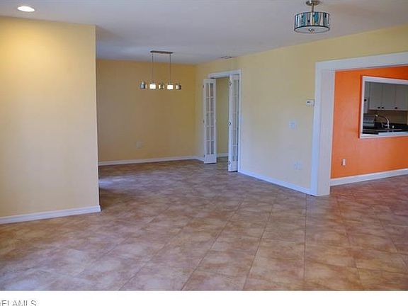 Living Room toward Dining, Kitchen, & Family Room