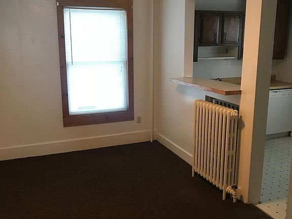 dining room with kitchen view to right