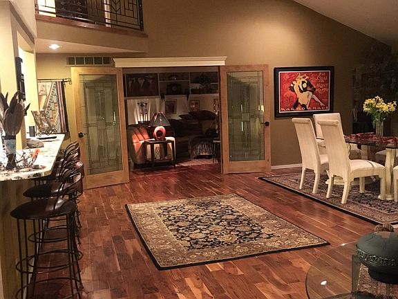 View from great room into den and master suite upstairs.