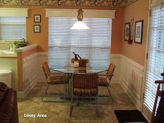 Breakfast area with window box molding and chair-rail