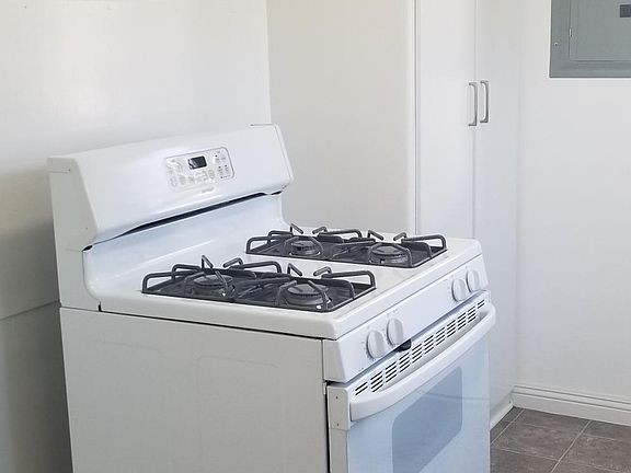 Stove and kitchen cupboards