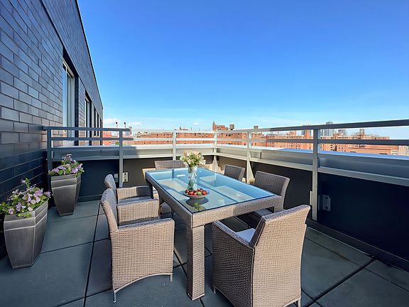 3rd image of 310 E 2nd St #Penthouse F